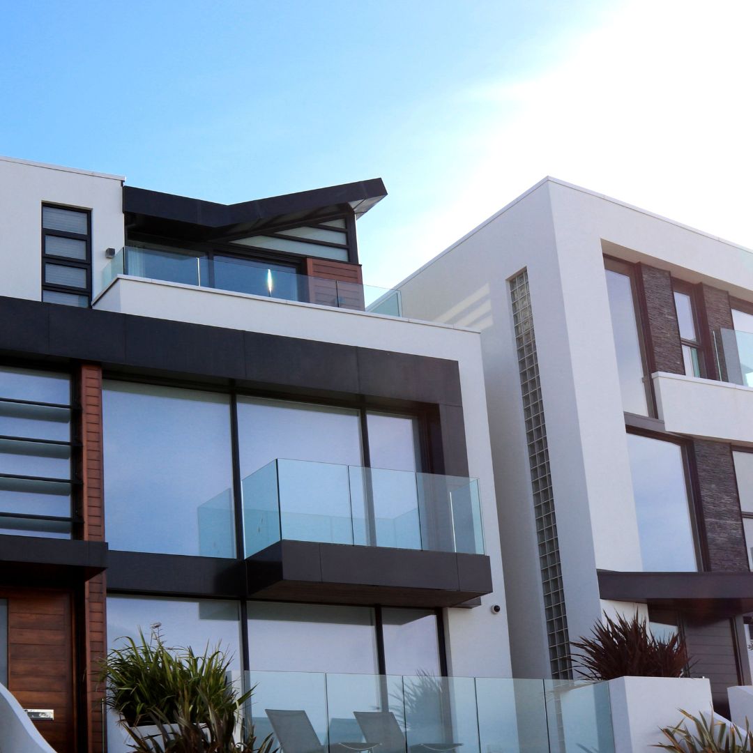 exterior of modern homes with large glass windows