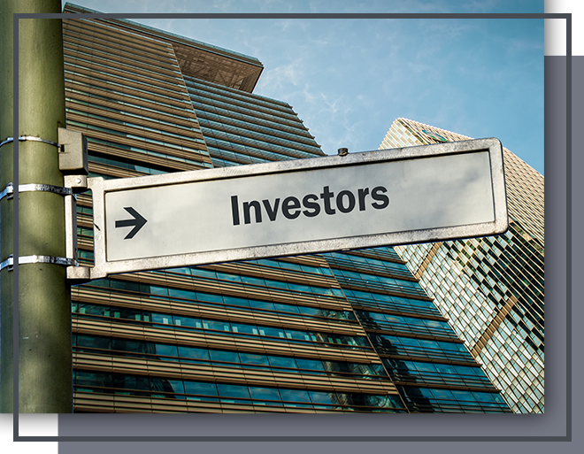Image of a sign with an arrow pointing to investors