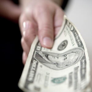 someone paying with cash