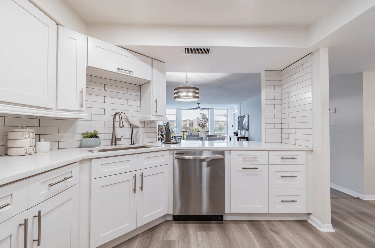 white kitchen with view to dining room