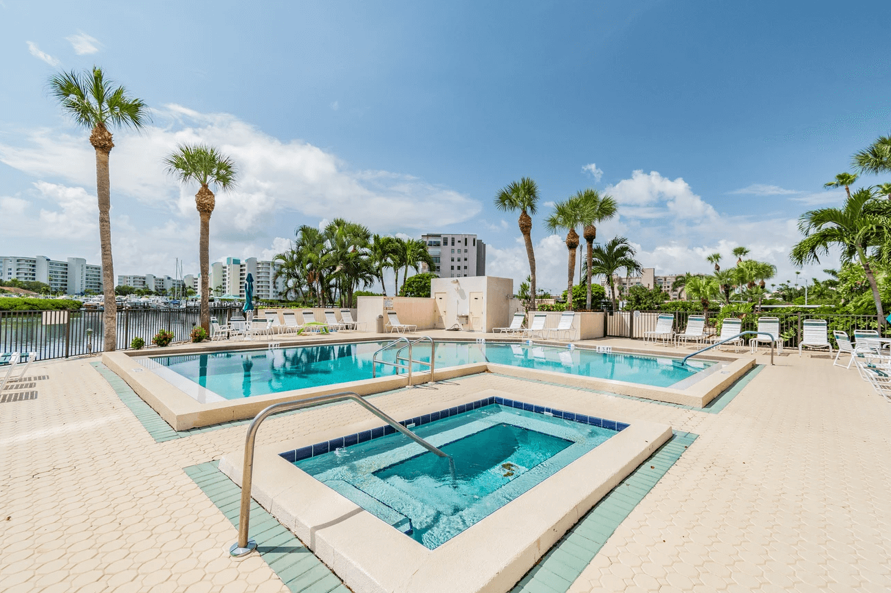pool and hot tub with palm trees