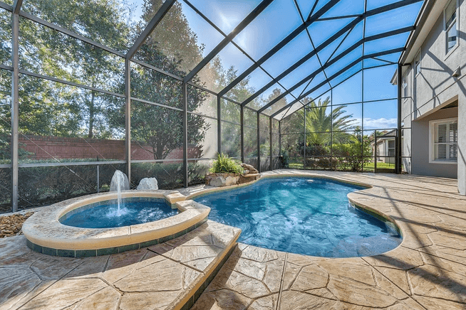 pool and spa with fountain
