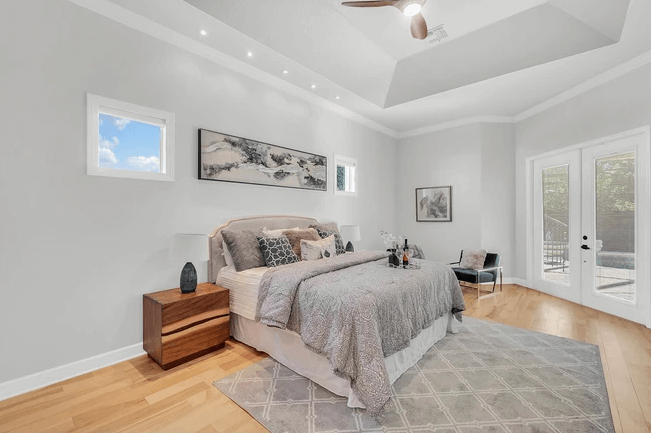 master bedroom with cove ceiling