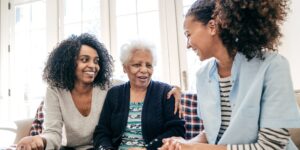 lady in assisted living with family