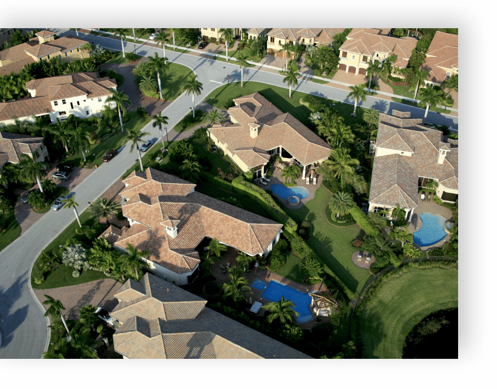 areal view of large houses in tropical location